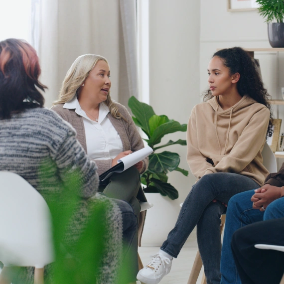 Women meeting in person